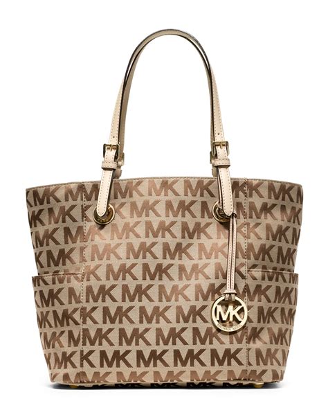 are michael kors bags stamped logo on zipper|michael kors purse logo.